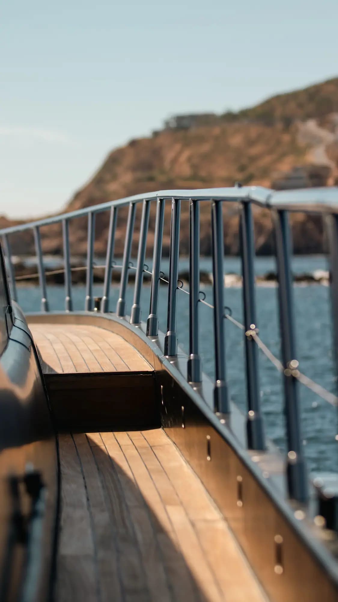 An open yacht deck facing the water.