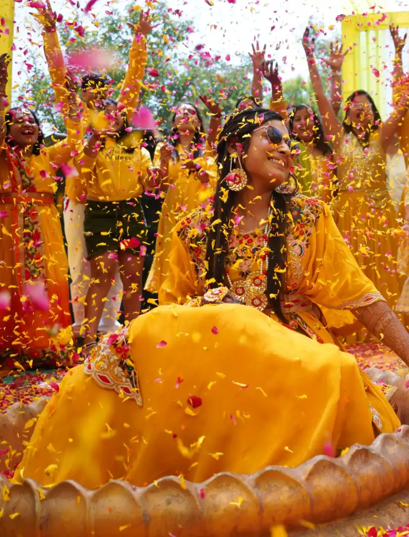 Guests celebrating together at an outdoor wedding gathering.